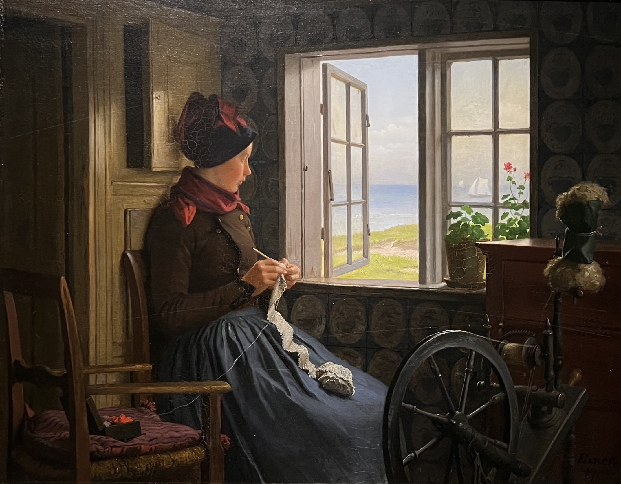 Julius Exners “En pige med sit hækletøj ved et åbentstående vindue” Julius Exners “En pige med sit hækletøj ved et åbentstående vindue”